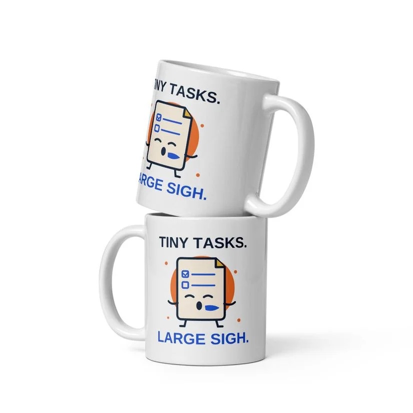 White 11 oz mug with the original sleepy checklist and Tiny Tasks. Large Sigh. graphic